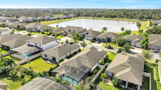 drone / aerial view with a water view