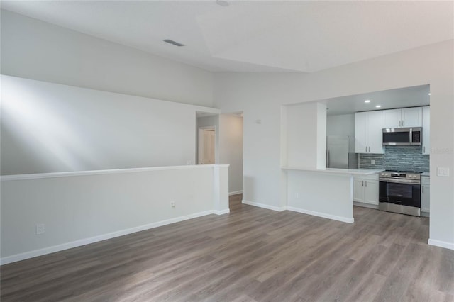 unfurnished living room with light wood-type flooring