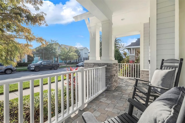 balcony featuring covered porch