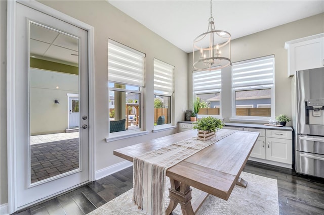 dining space with an inviting chandelier and plenty of natural light