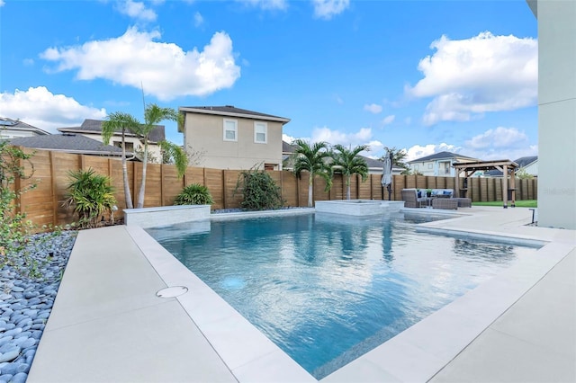 view of swimming pool featuring a patio area and an outdoor living space