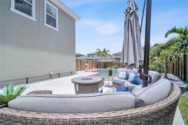 view of patio / terrace with a fire pit