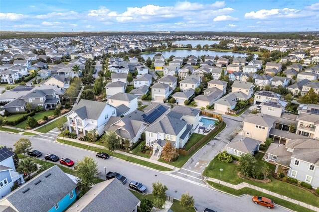 bird's eye view with a water view