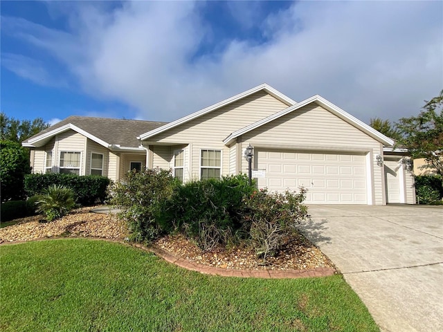 single story home featuring a garage