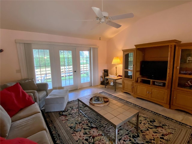 living room featuring light tile patterned floors, french doors, ceiling fan, and lofted ceiling