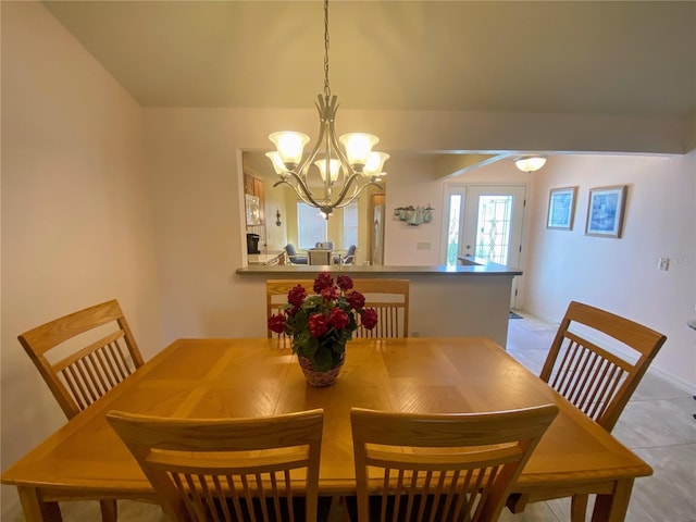 dining room featuring a chandelier