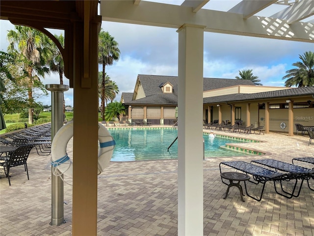 view of swimming pool featuring a patio area