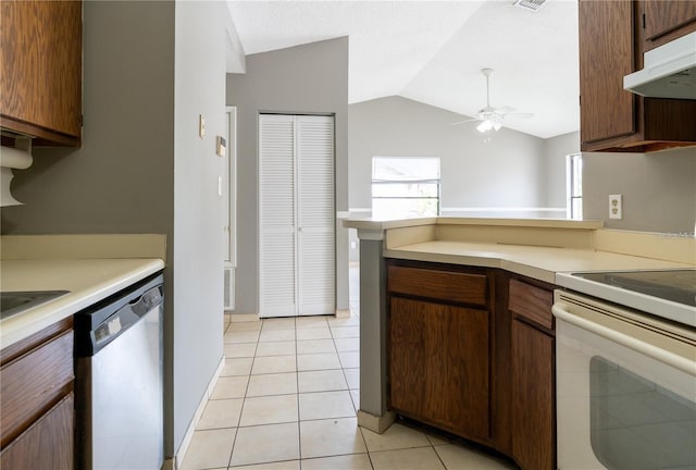 kitchen featuring electric range, ceiling fan, stainless steel dishwasher, lofted ceiling, and light tile patterned flooring