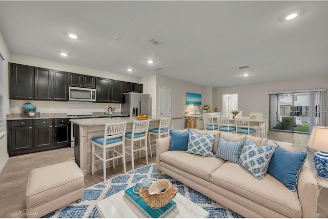 living room with sink