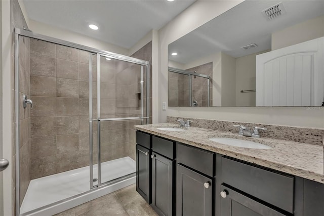 bathroom with vanity and walk in shower