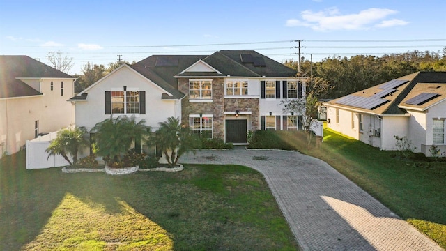 view of front facade featuring a front yard