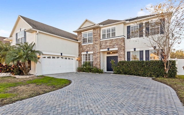 view of front of home with a garage