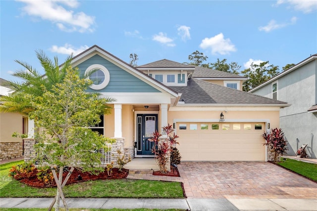 view of front of property featuring a garage