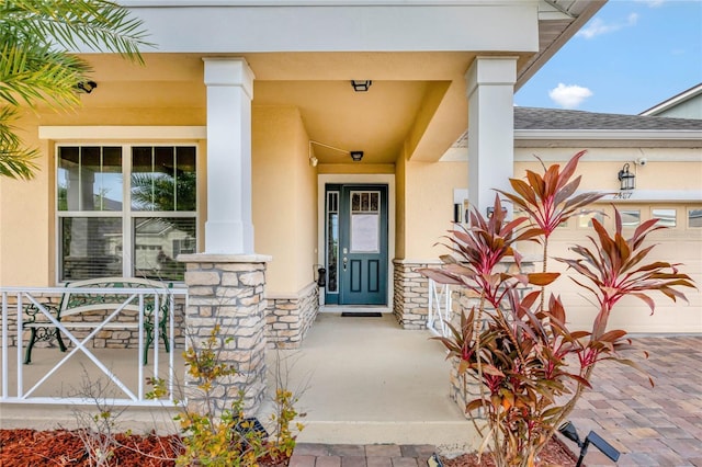 property entrance with a garage