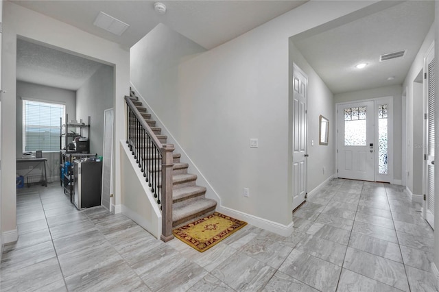 entryway featuring plenty of natural light