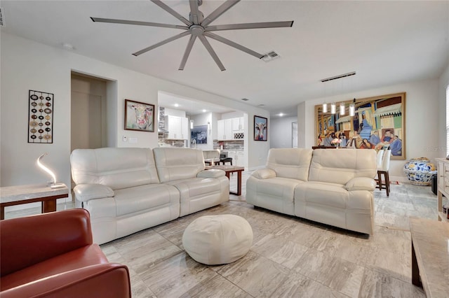 living room with ceiling fan