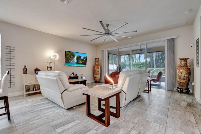 living room featuring ceiling fan