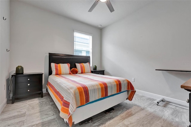 bedroom featuring wood-type flooring and ceiling fan