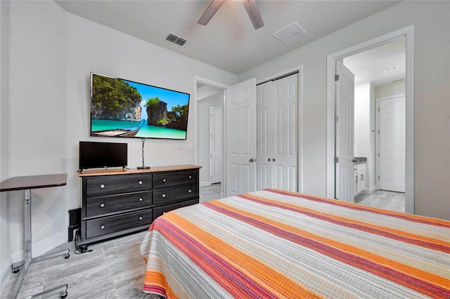 bedroom featuring ceiling fan and a closet