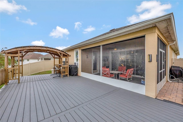 deck featuring a sunroom