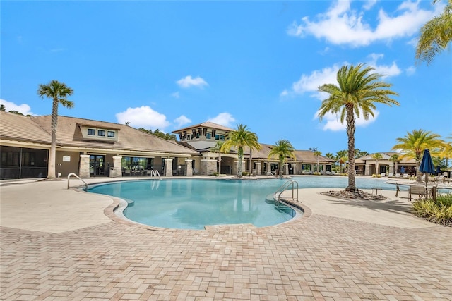 view of swimming pool featuring a patio