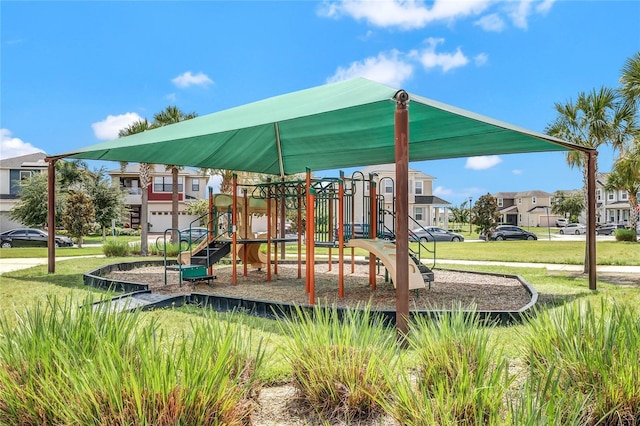 view of playground featuring a lawn