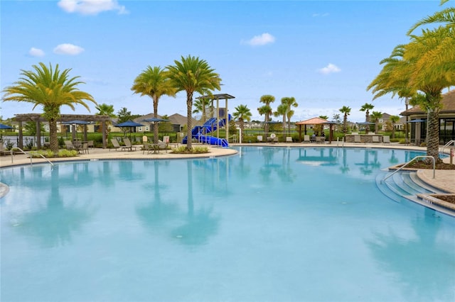 view of swimming pool with a patio area