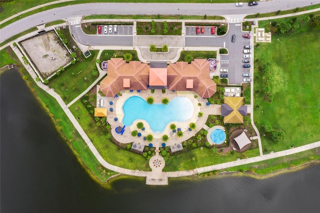 birds eye view of property featuring a water view