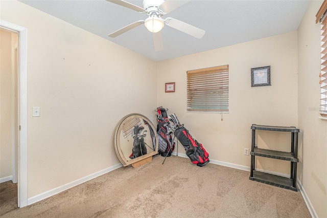 misc room with ceiling fan and light carpet