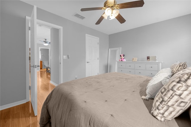 bedroom featuring ceiling fan and light wood-type flooring