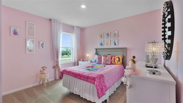 bedroom with light colored carpet