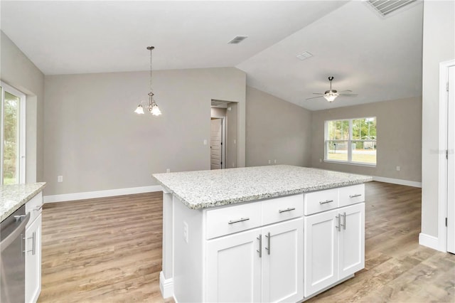 kitchen with white cabinetry, dishwasher, lofted ceiling, and light hardwood / wood-style flooring