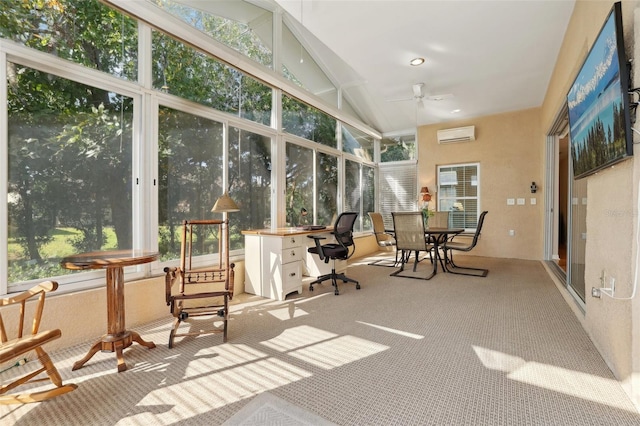 sunroom / solarium with a wall mounted air conditioner, ceiling fan, a healthy amount of sunlight, and vaulted ceiling