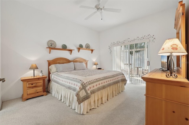 bedroom with ceiling fan and light colored carpet