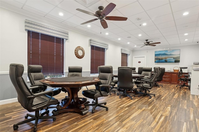 office area featuring a paneled ceiling, ceiling fan, wood-type flooring, and ornamental molding