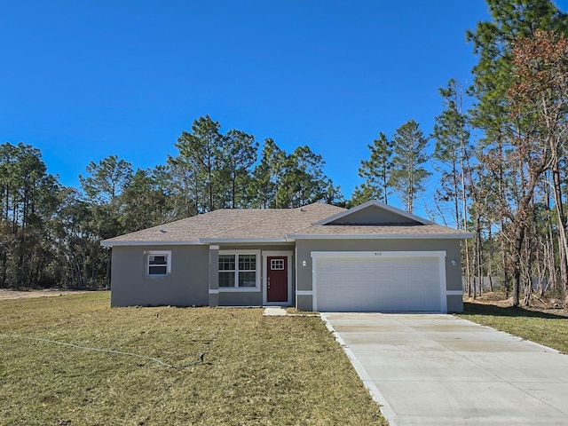 single story home featuring a front yard and a garage