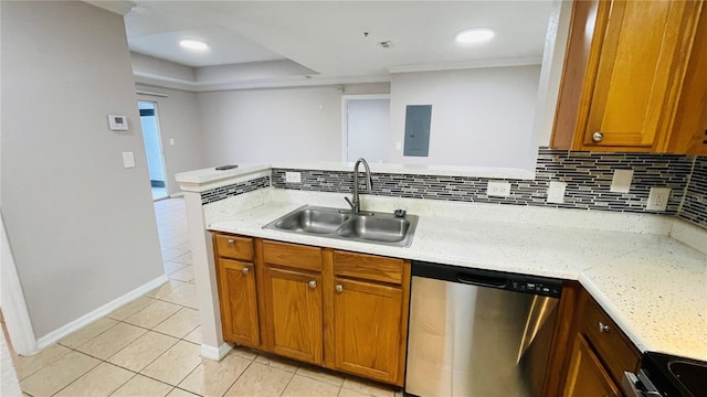 kitchen featuring sink, stainless steel dishwasher, stove, decorative backsplash, and light tile patterned flooring