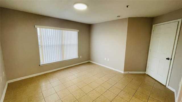 view of tiled spare room