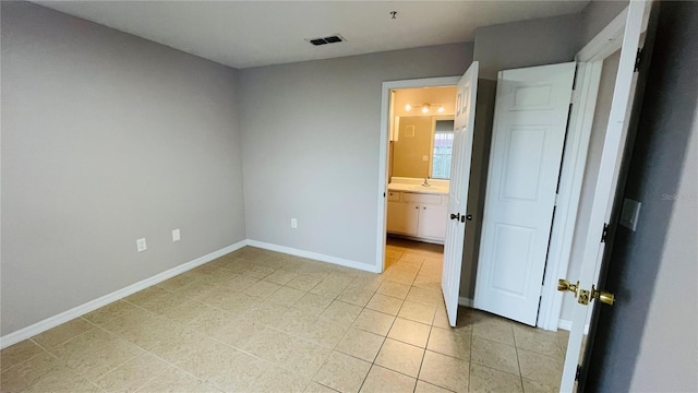 unfurnished bedroom with sink