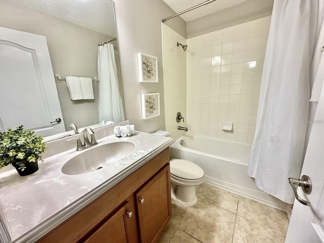 full bathroom with tile patterned floors, toilet, vanity, and shower / bath combo