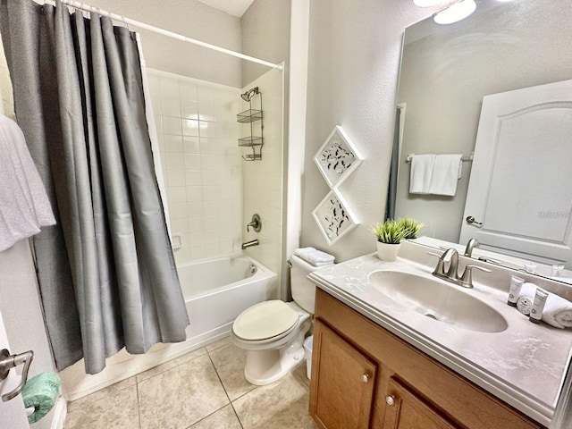 full bathroom featuring tile patterned floors, shower / tub combo with curtain, vanity, and toilet