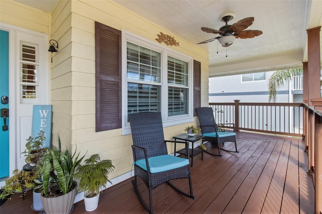 deck featuring ceiling fan and covered porch