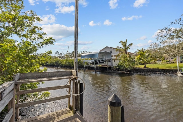 dock area with a water view