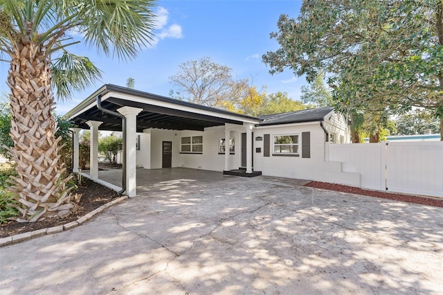 view of patio / terrace featuring a carport