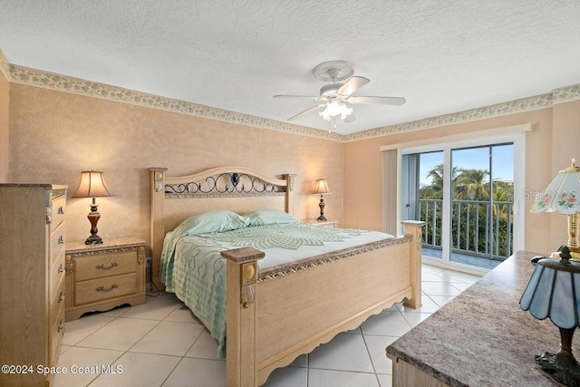 bedroom featuring access to outside, ceiling fan, light tile patterned floors, and a textured ceiling