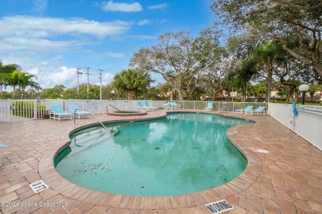 view of pool with a patio