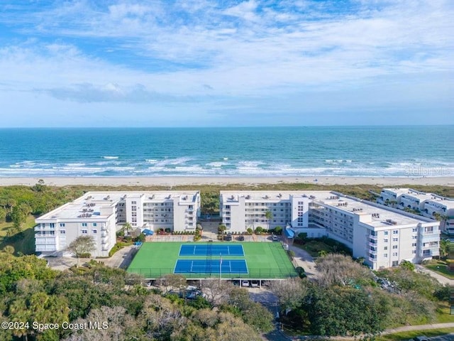 aerial view featuring a view of the beach and a water view