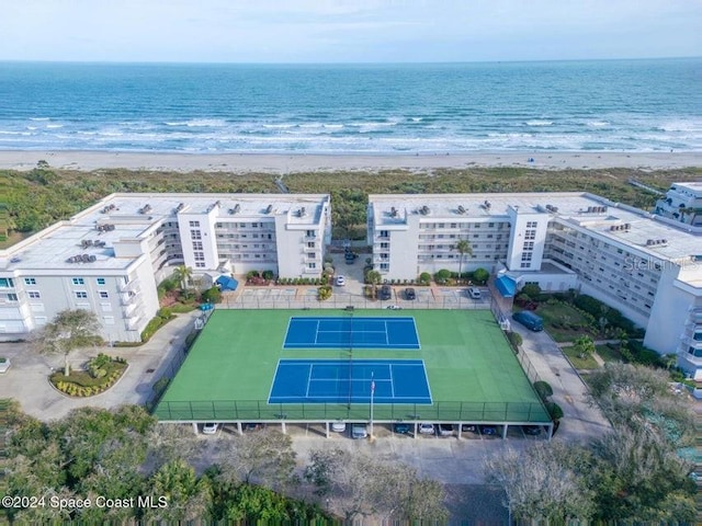 bird's eye view with a beach view and a water view