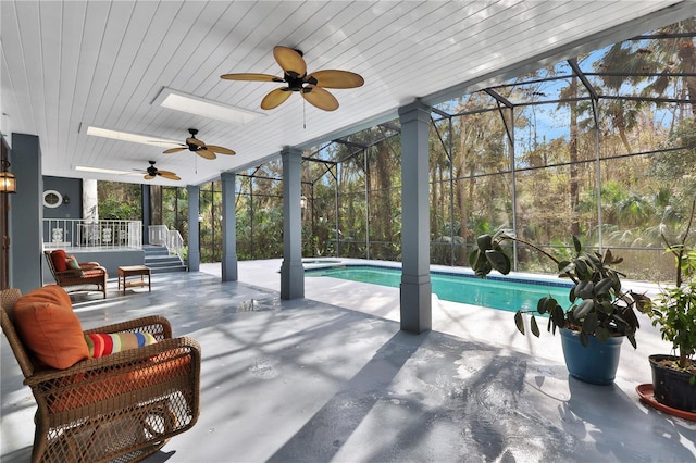 view of patio / terrace with a lanai