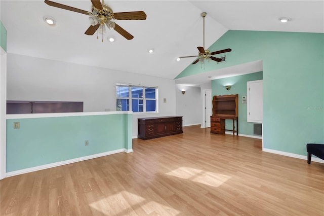 unfurnished living room with ceiling fan, light hardwood / wood-style floors, and vaulted ceiling